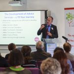 photo: Michael Bell speaking at Advice North Somerset Conference